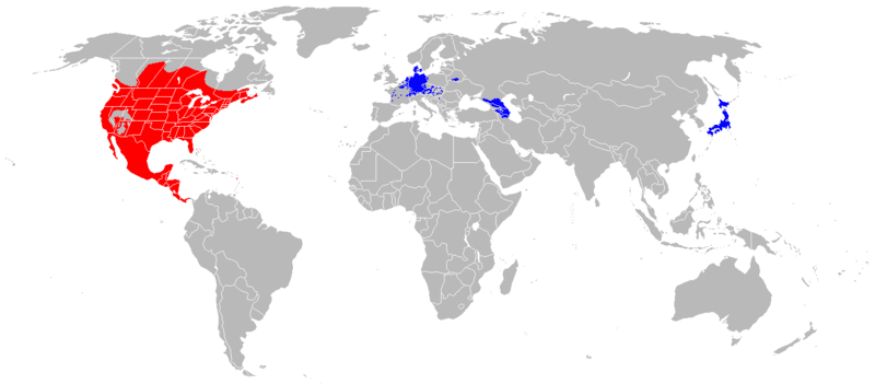 Graphic map of raccon ranges with native ranges colored in red and introduced ranges in blue